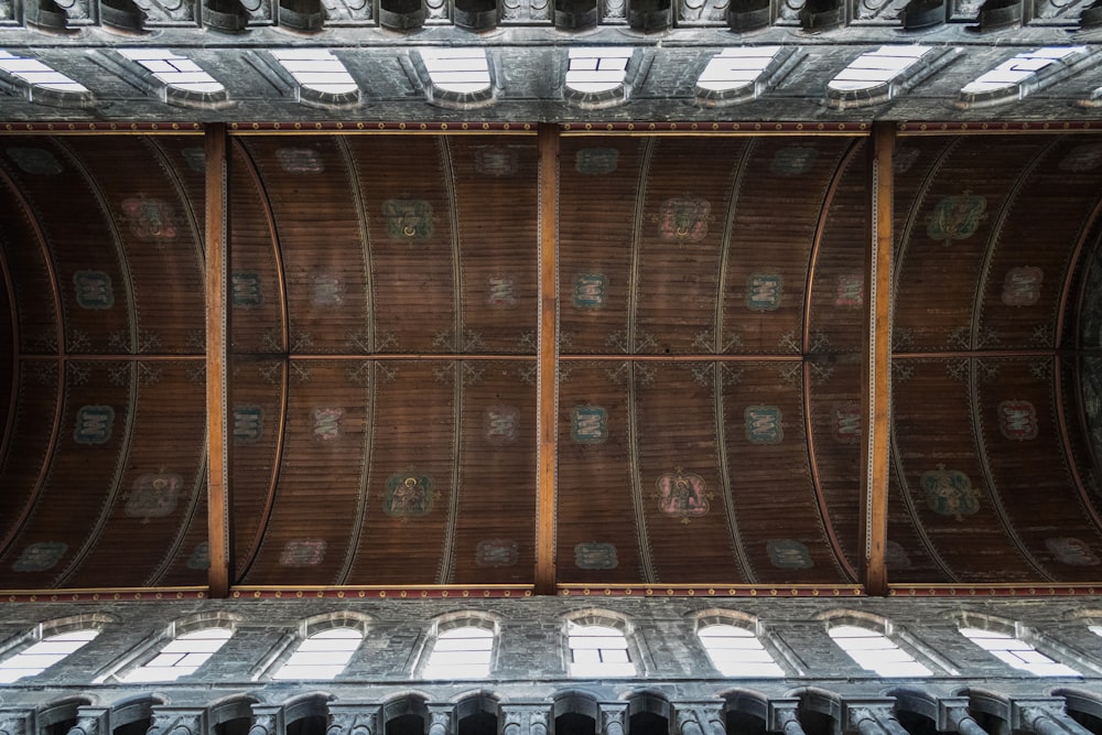 a large wooden structure with many windows in it