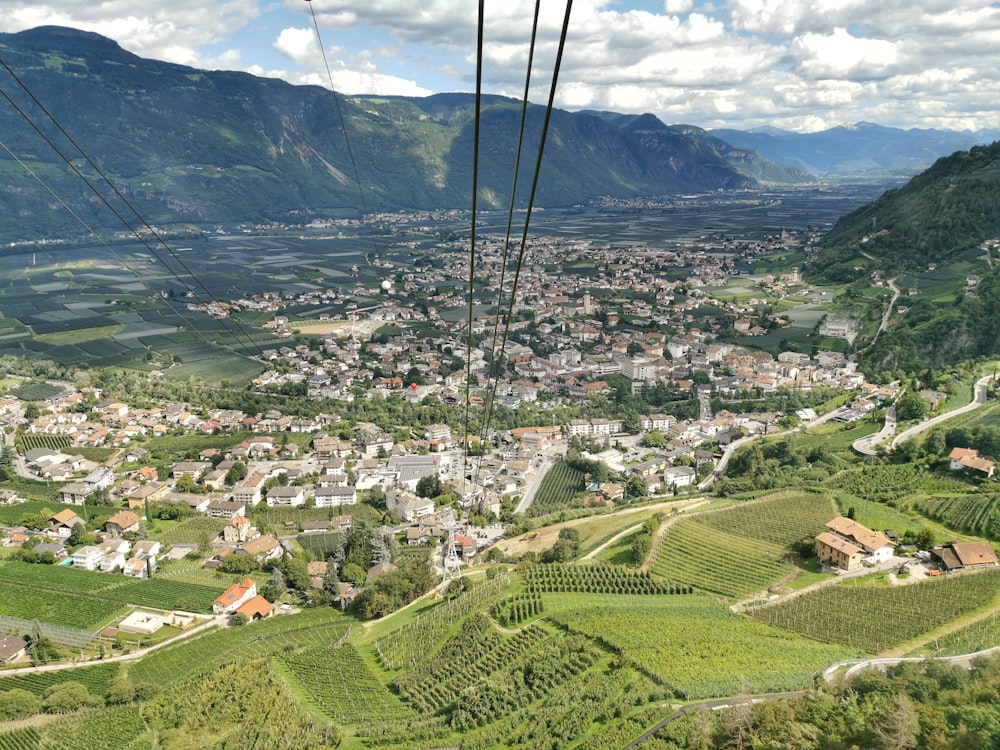 a view of a town from a cable car