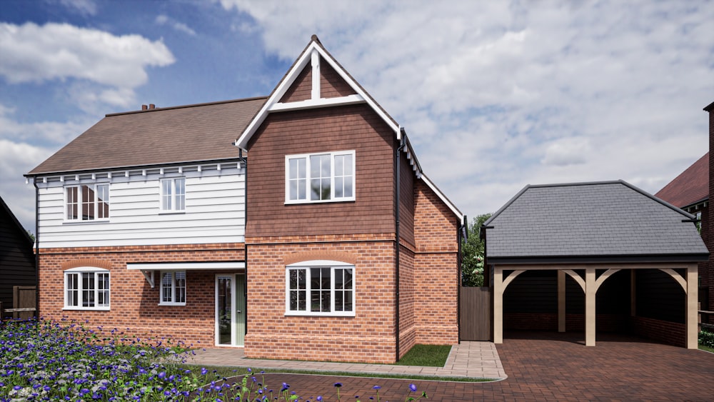 a two story brick house with a garage