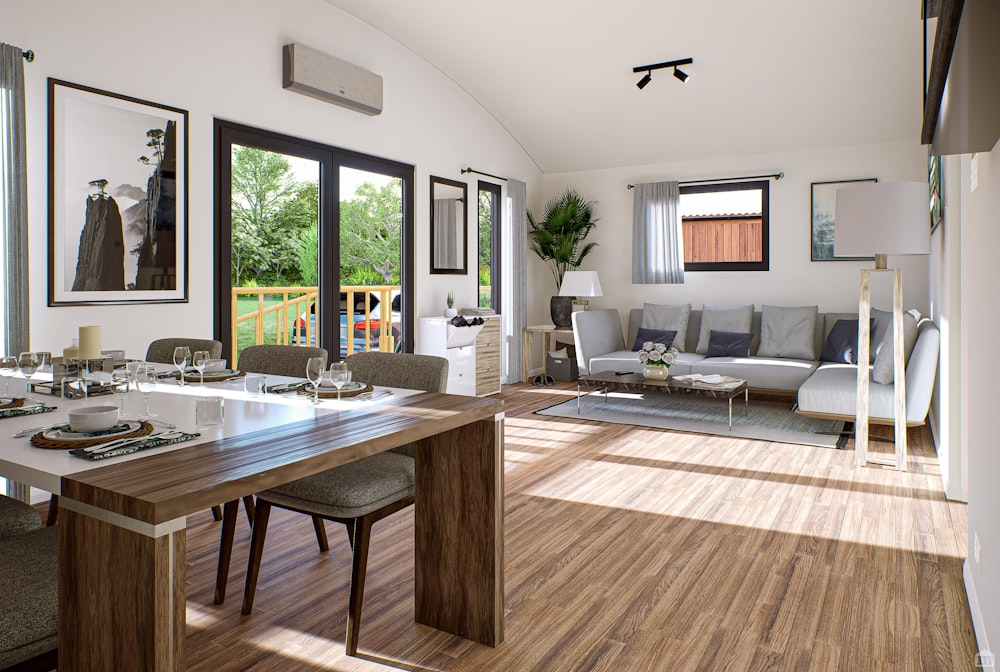 a living room with a dining table and a couch