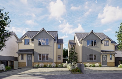 a two story house with a lot of windows