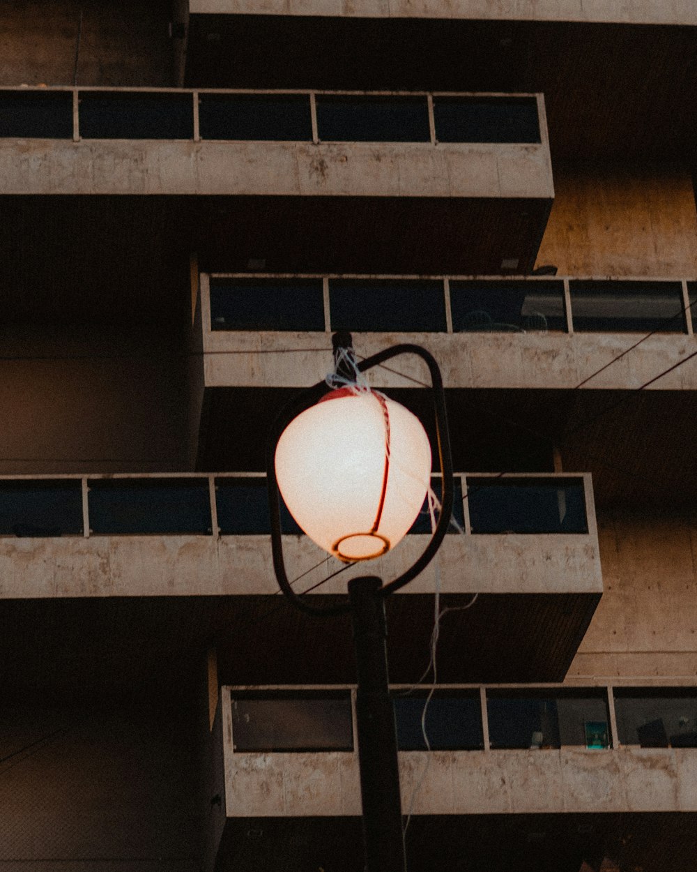 a street light in front of a building