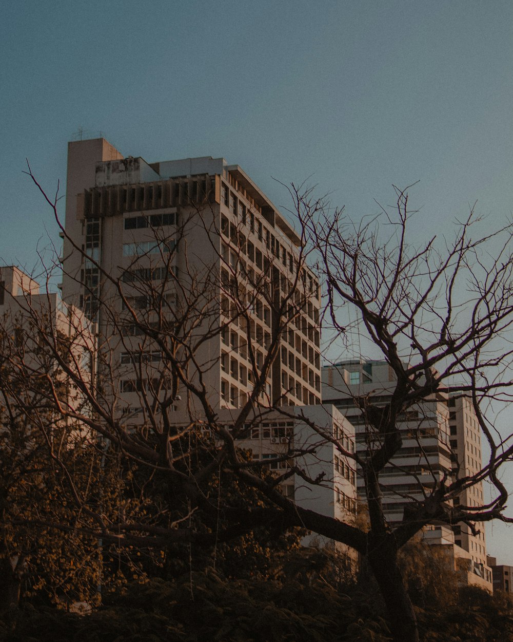 a tall building with a clock on the top of it