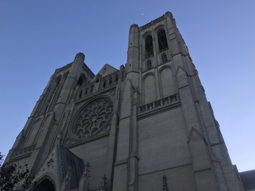 a large cathedral with a clock on the front of it