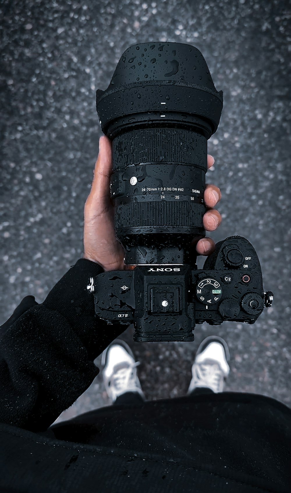 a person holding a camera in their hands