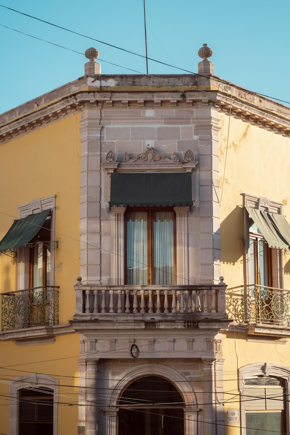 an old building with a balcony and balconies