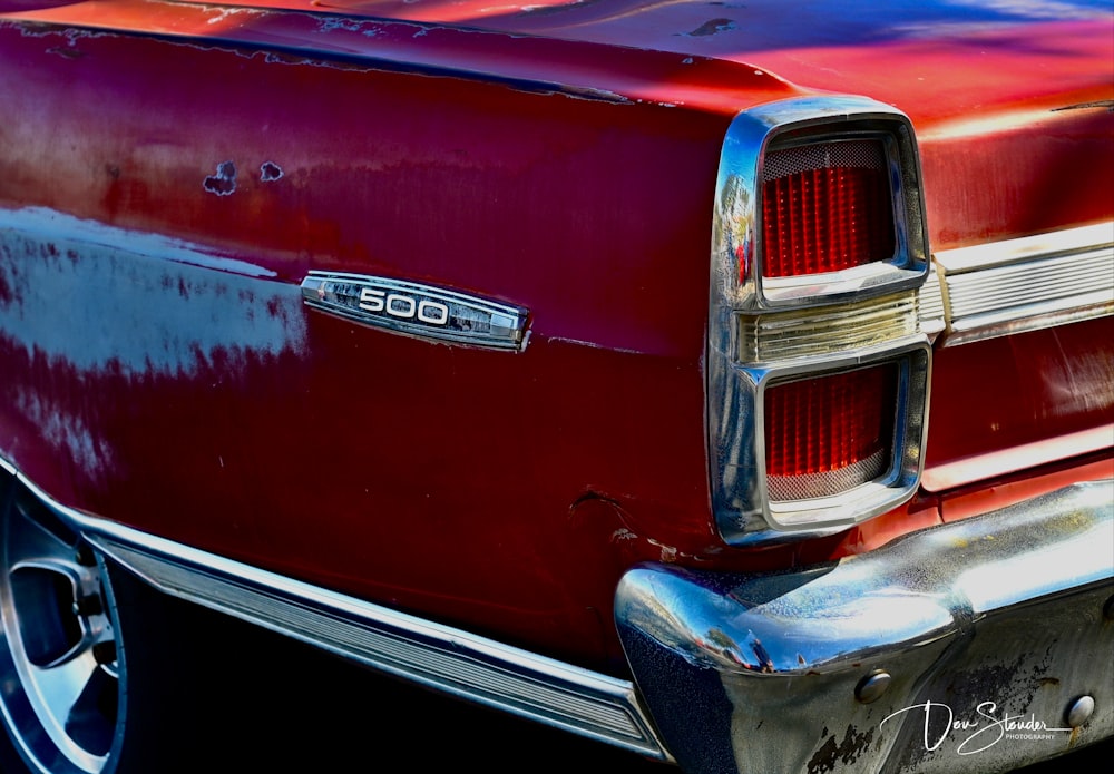 a close up of the front of a classic car