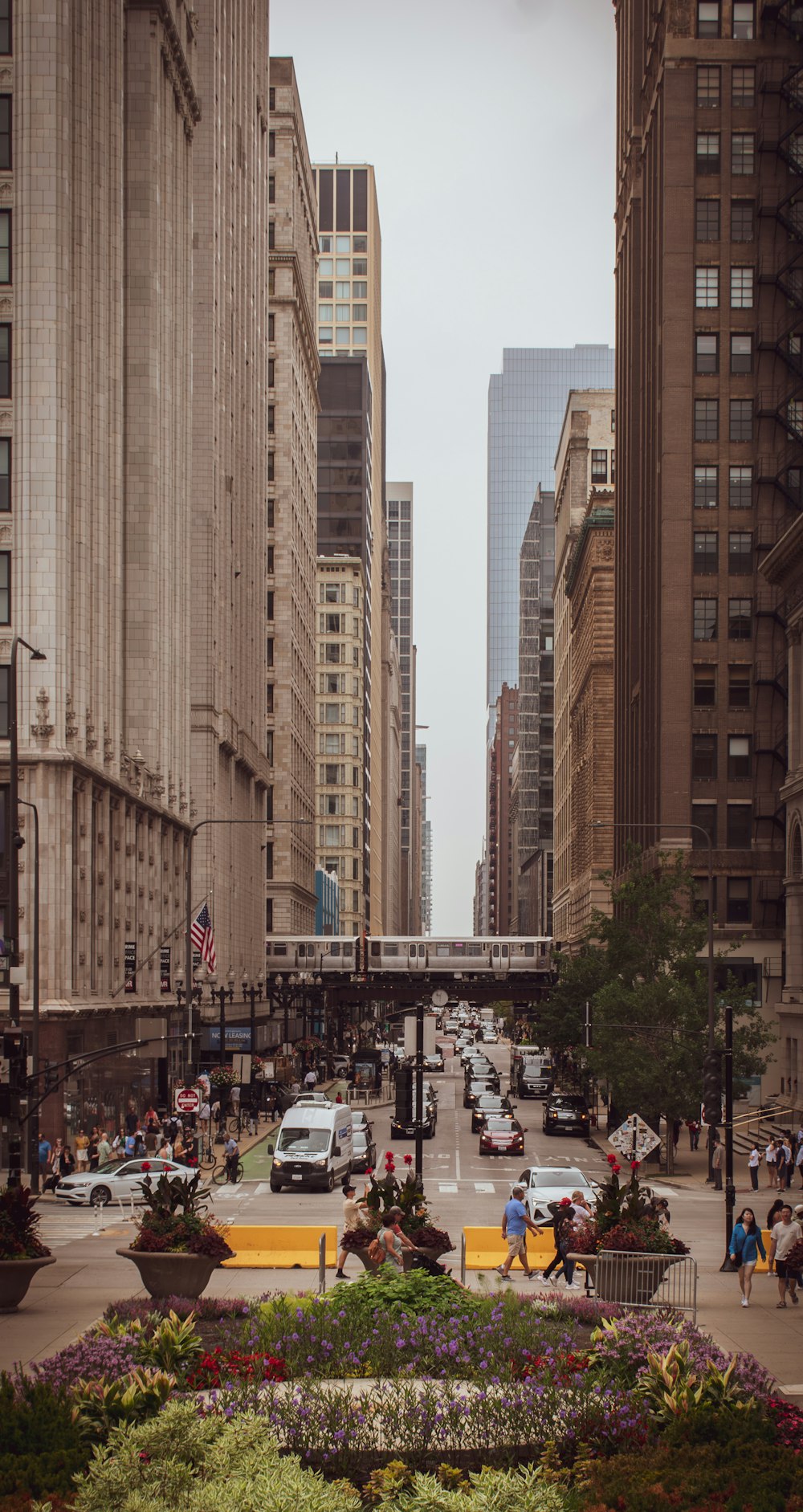 a city street filled with lots of tall buildings