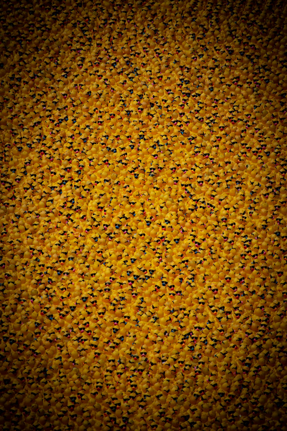 a yellow background with small black dots