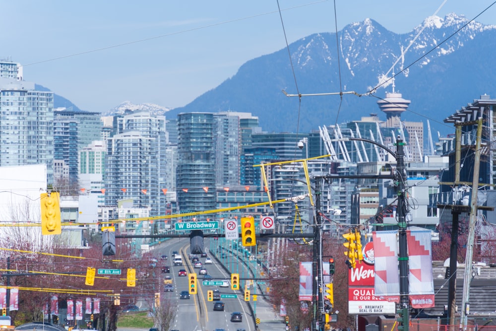 a view of a city with mountains in the background