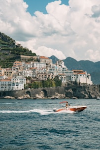a person on a boat in the water