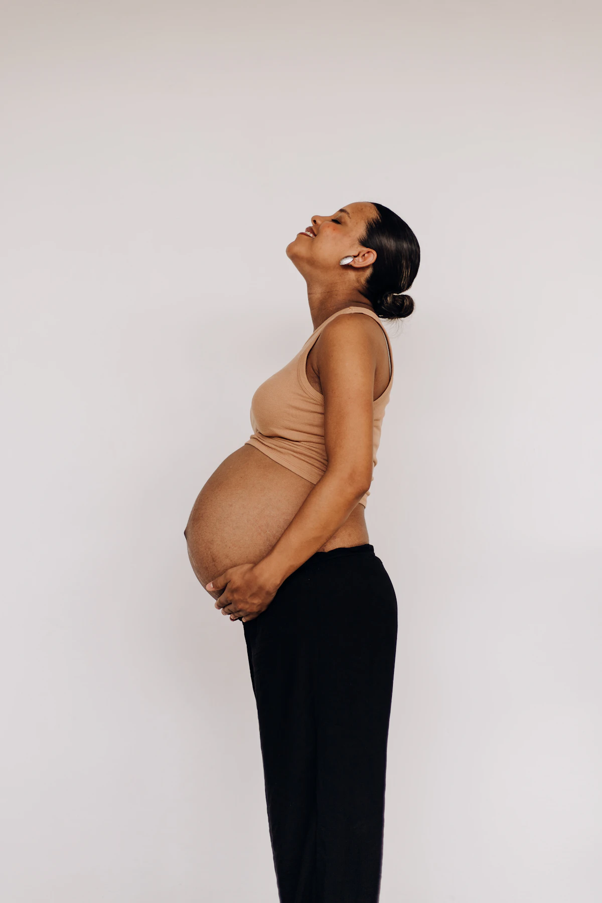 Pregnant woman in workout clothes