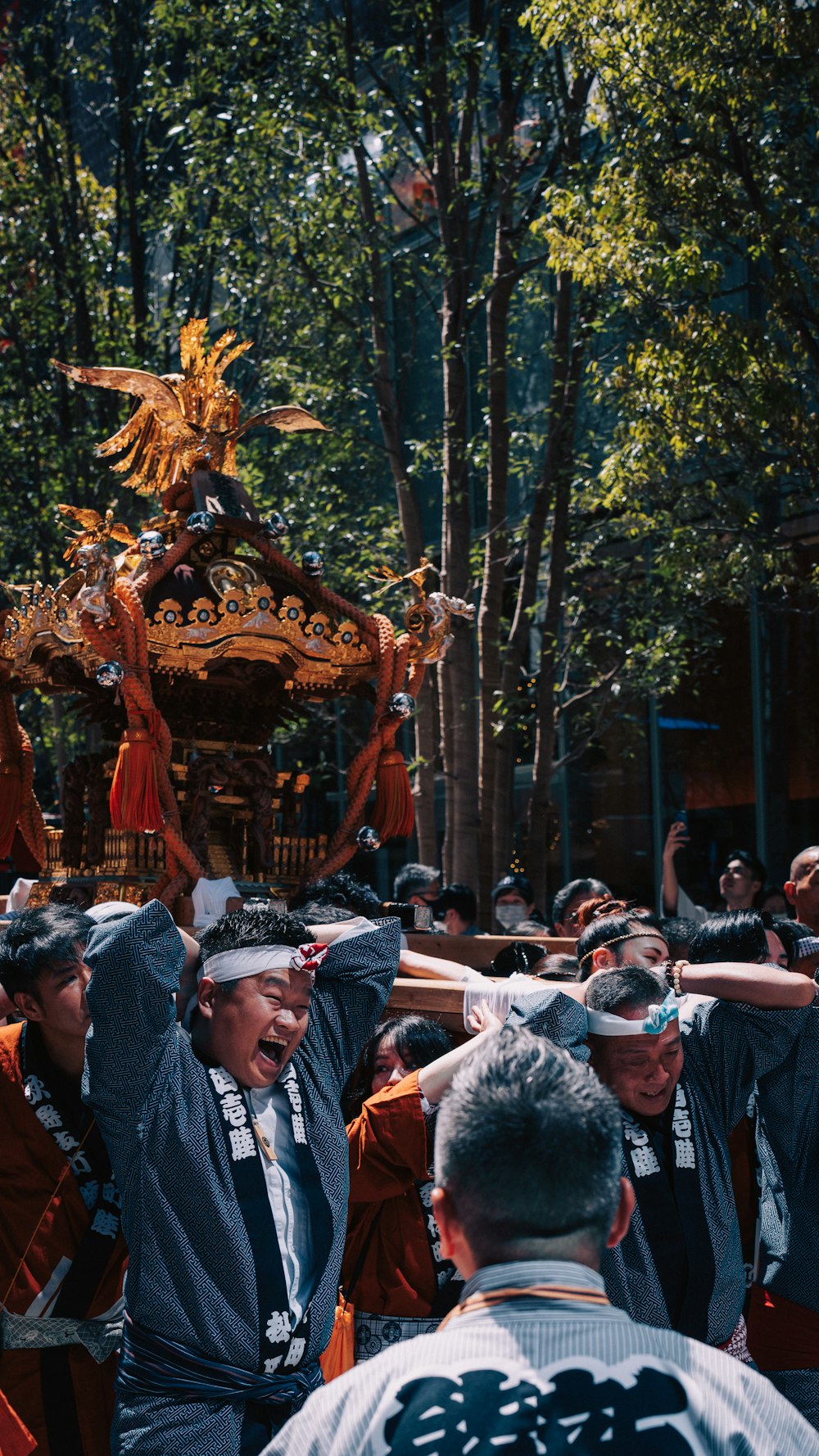 a group of people standing around each other