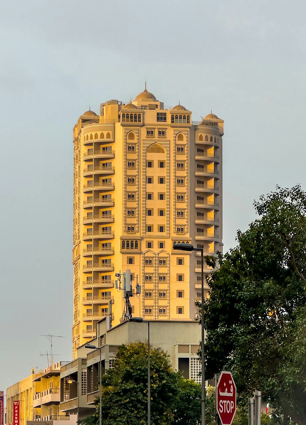 a stop sign in front of a tall building