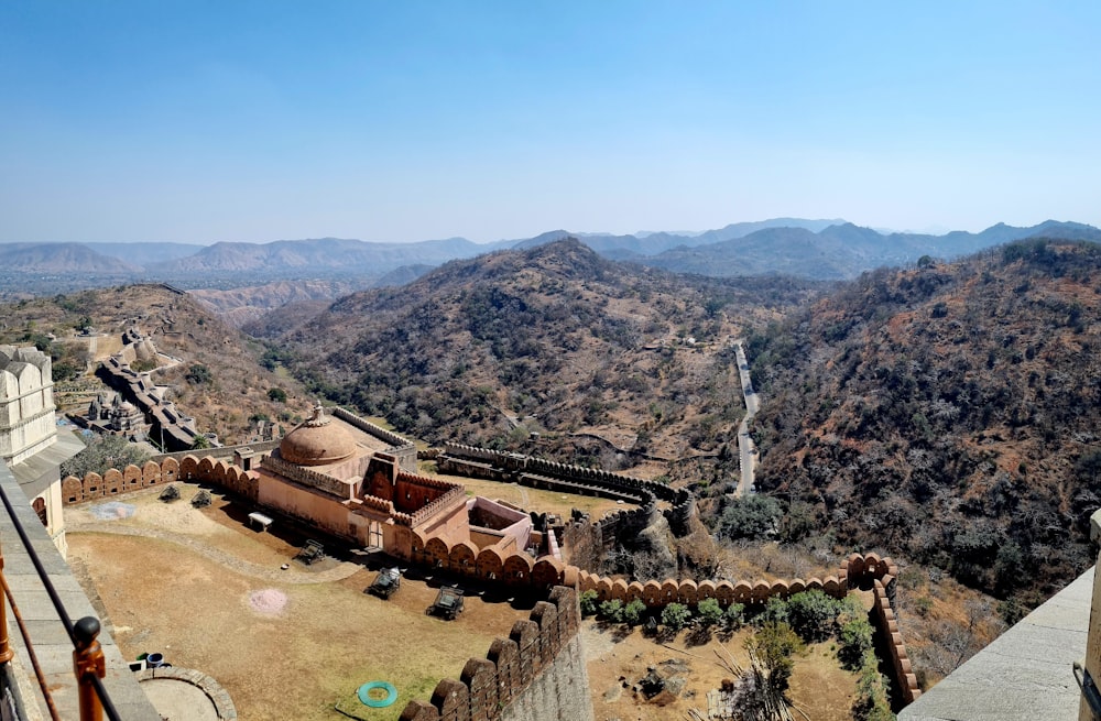 a view of the mountains from the top of a building