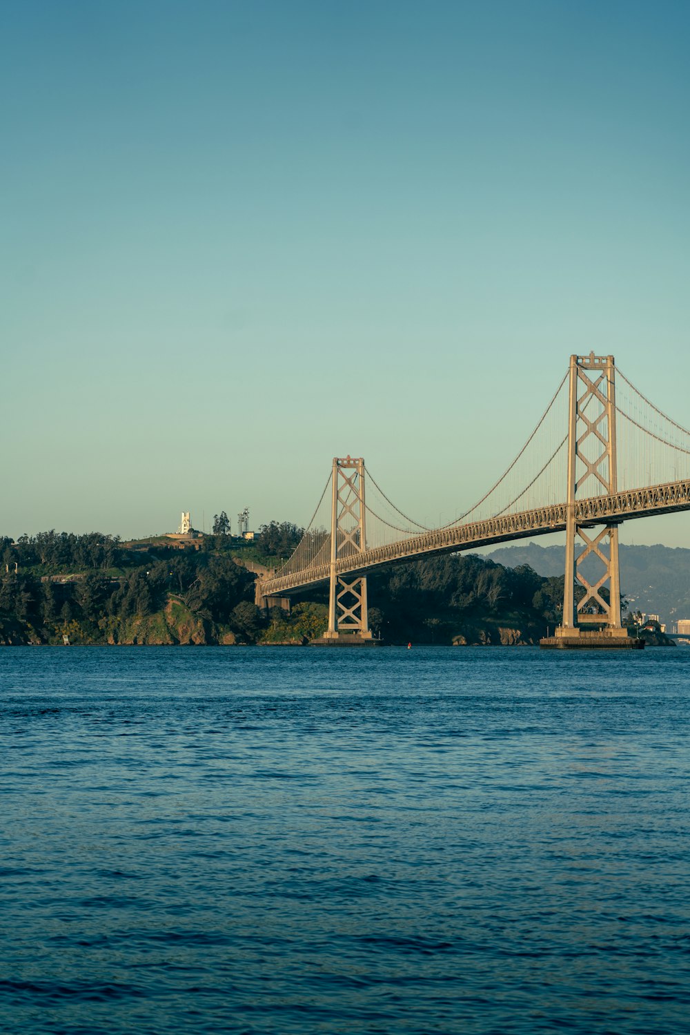 a large bridge spanning over a large body of water