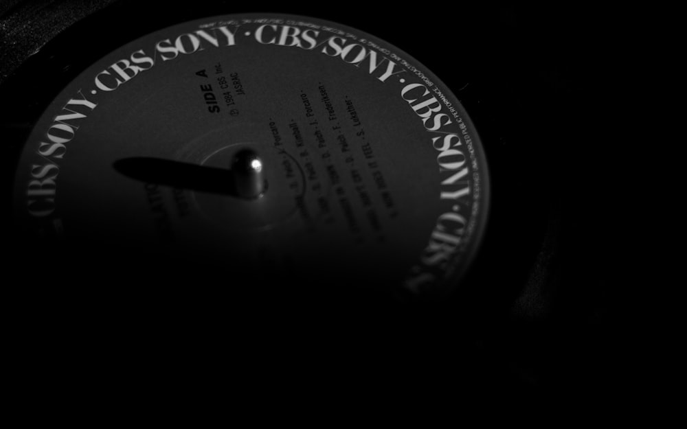 a black and white photo of a record