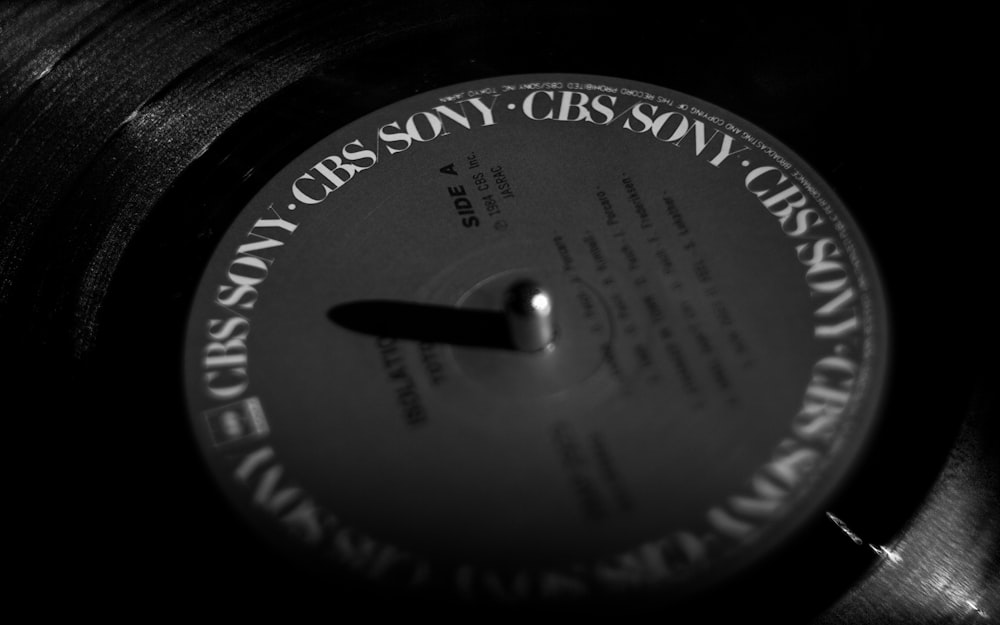 a black and white photo of a record