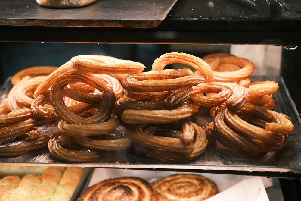 a display case filled with lots of different types of pastries