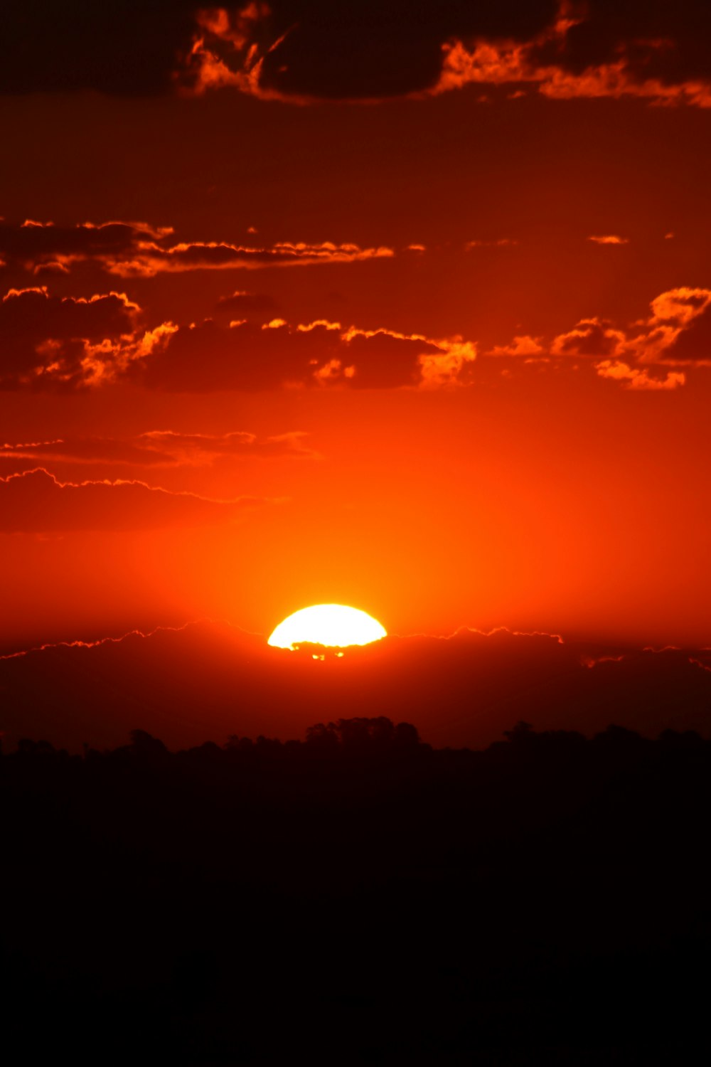 the sun is setting over the horizon of the horizon