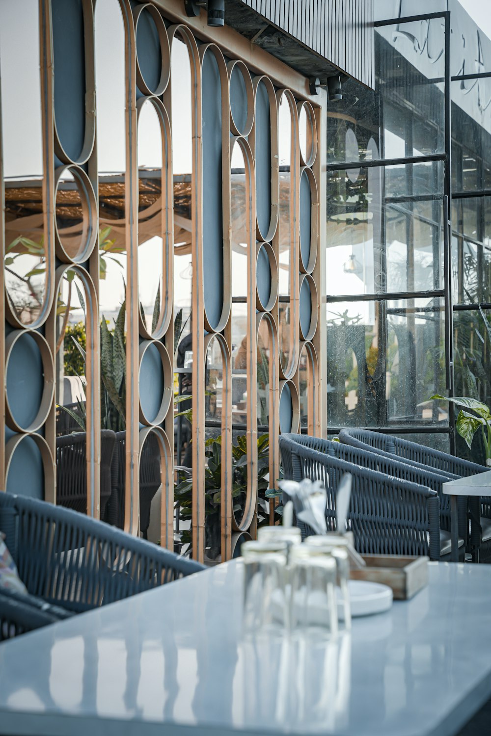 a table and chairs in front of a building