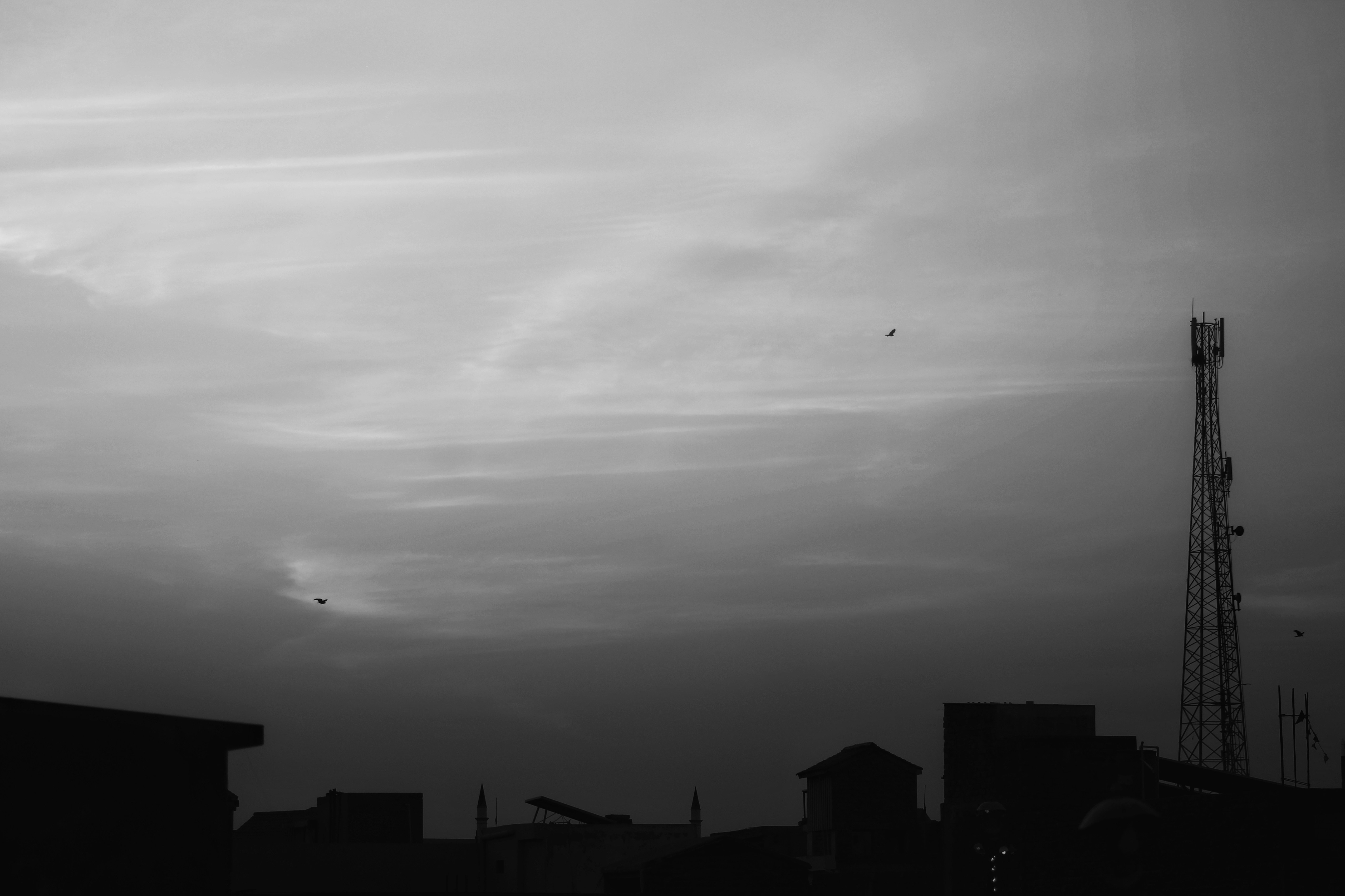 a black and white photo of a cloudy sky