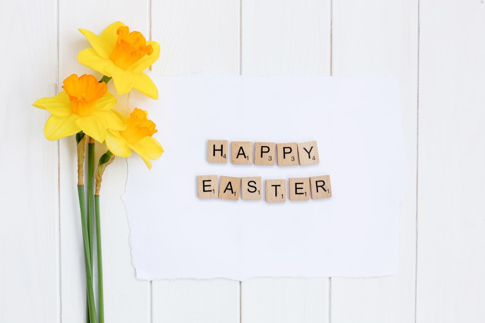 a piece of paper with the words happy easter spelled on it