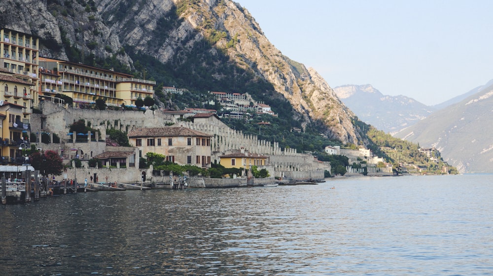 a body of water with buildings on the side of it