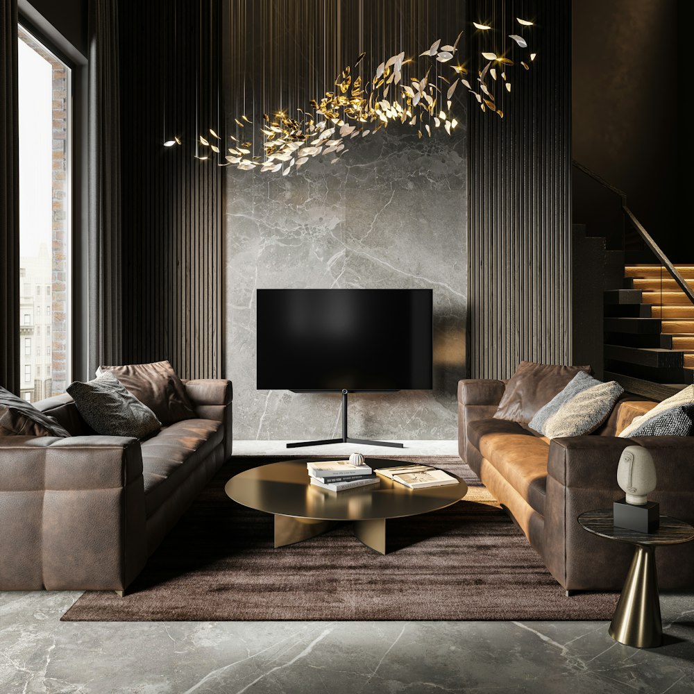 a living room filled with furniture and a flat screen tv