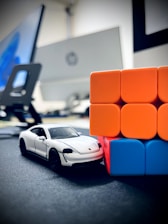 a toy car sitting on top of a table
