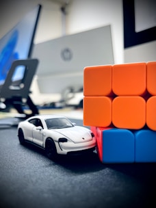 a toy car sitting on top of a table