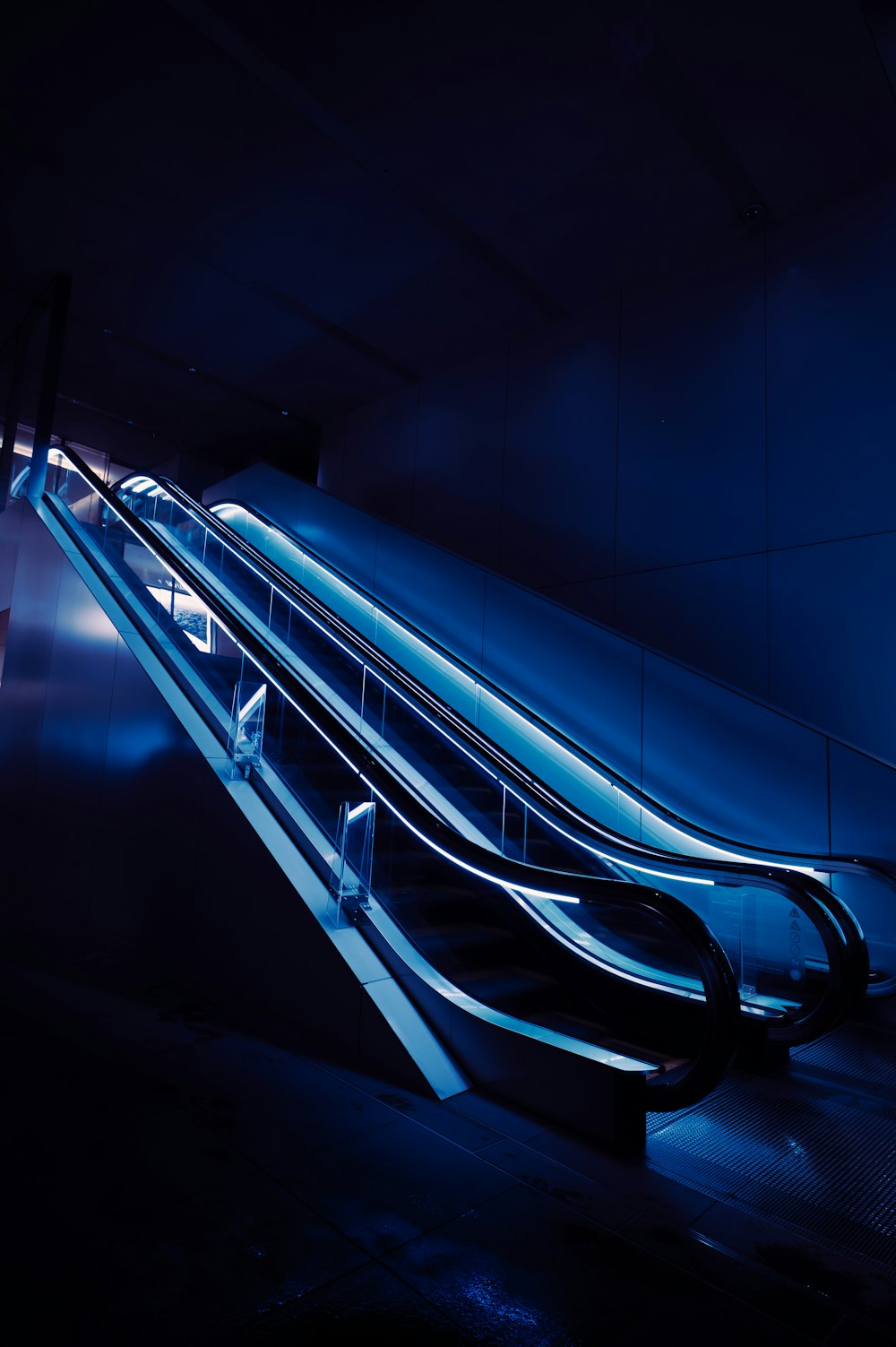 a couple of escalators sitting next to each other