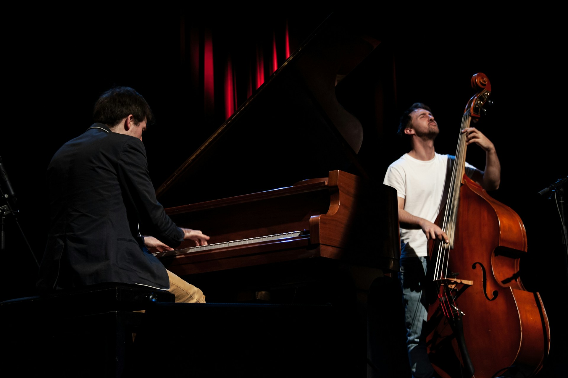 a group of men playing musical instruments on stage