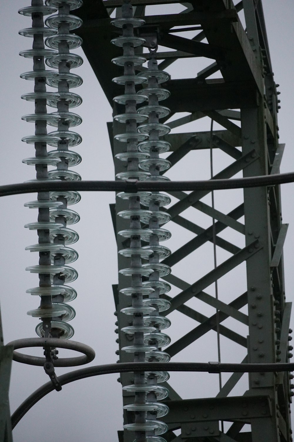 a close up of a metal structure with wires attached to it