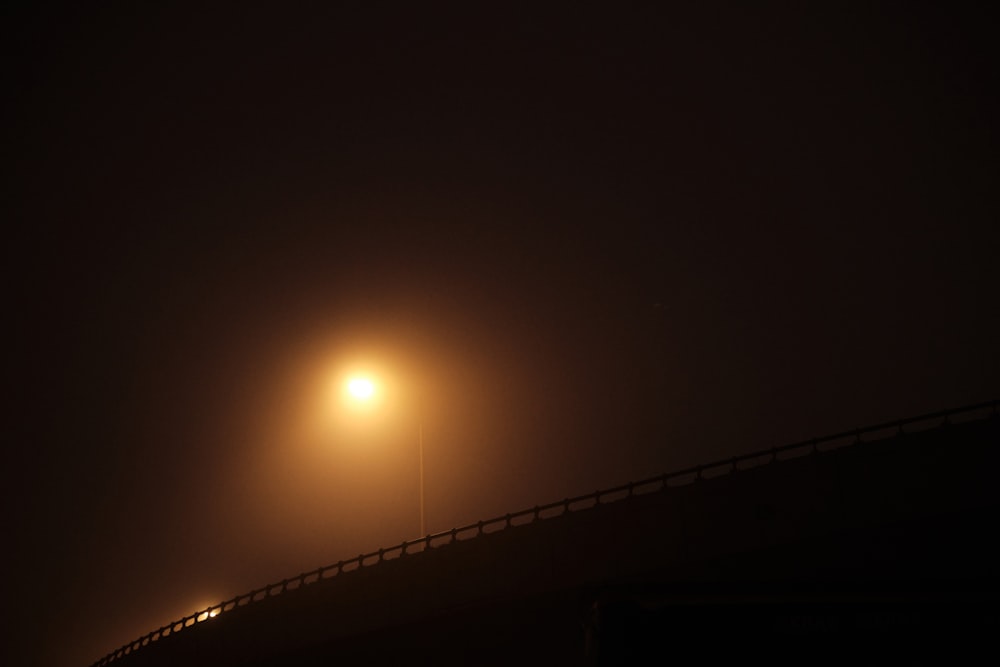 a street light on a foggy night