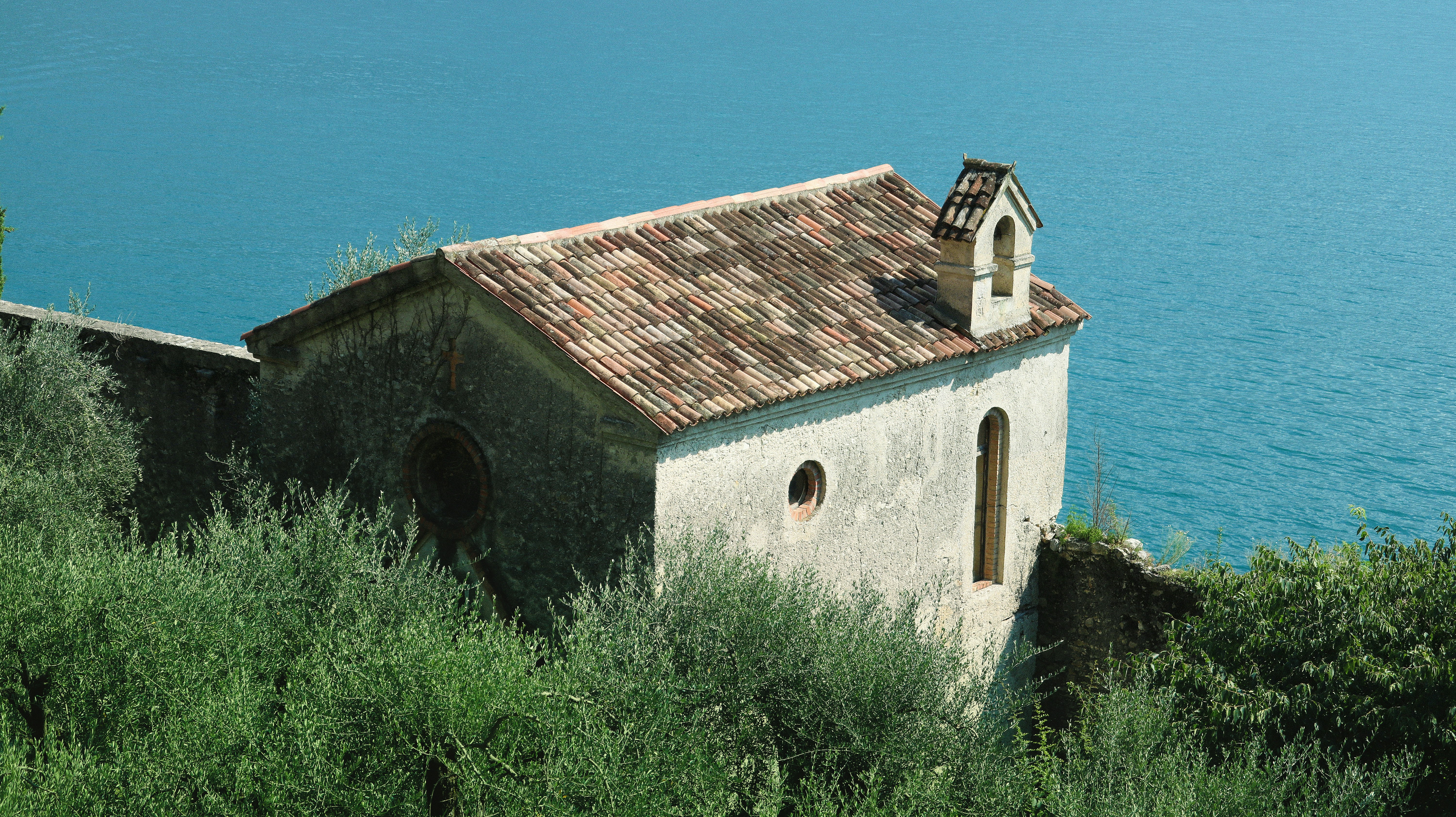 an old church on a cliff overlooking the ocean, Italian summer_23