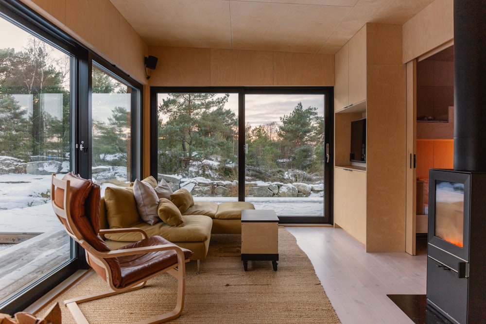 a living room filled with furniture and a flat screen tv