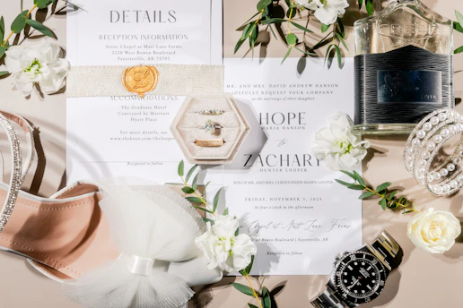 a table topped with a pair of shoes and a paper