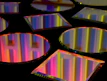 a group of circular mirrors sitting on top of a table