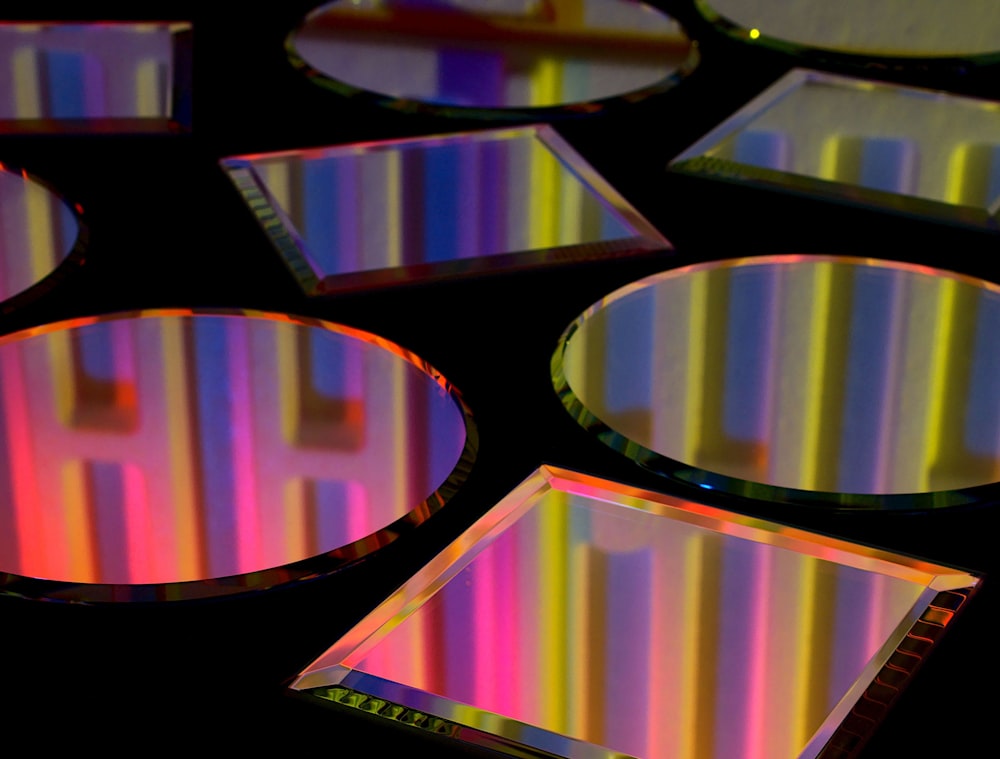 a group of circular mirrors sitting on top of a table