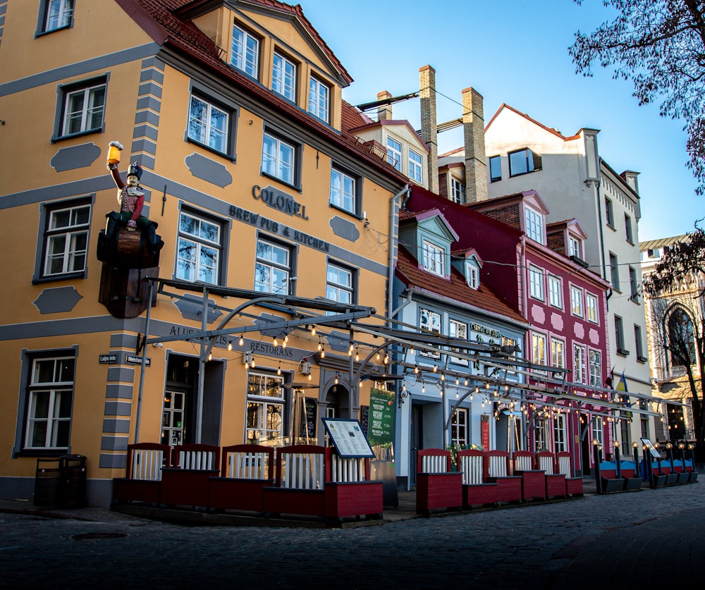 a row of buildings on a city street