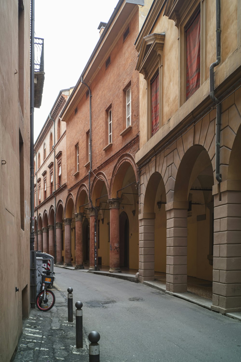 a bike parked on the side of a street