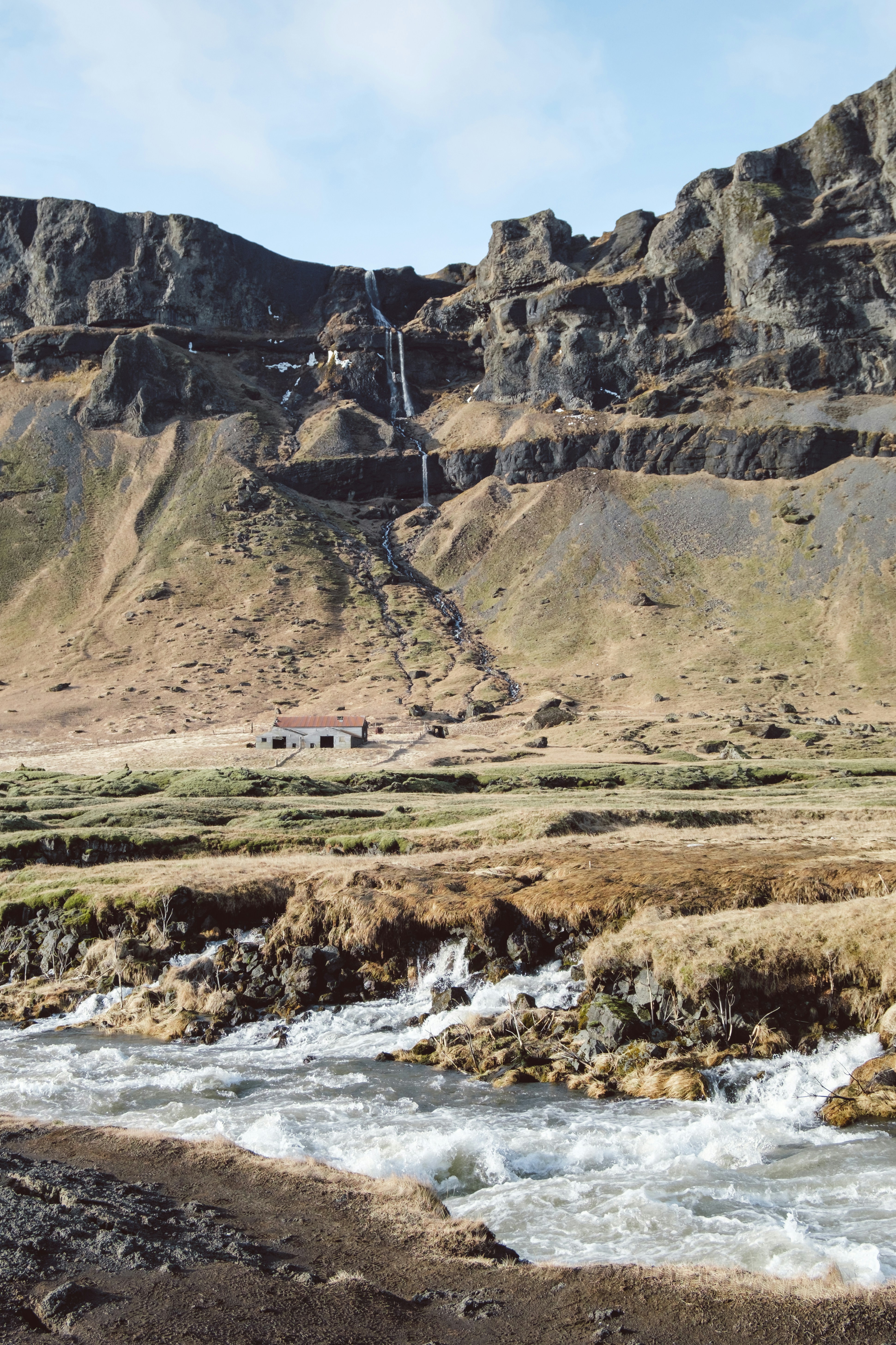 a mountain with a river running through it