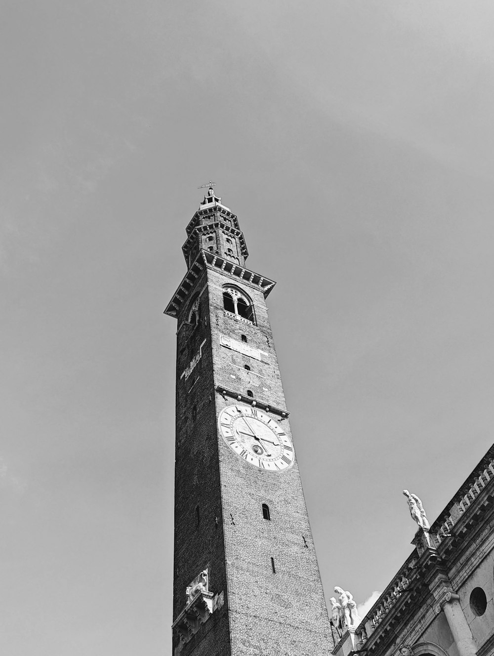 a tall clock tower towering over a city