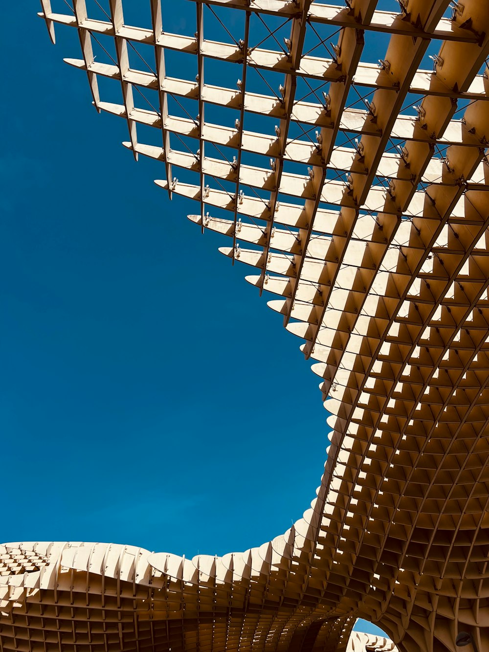 a view of a very tall structure with a sky background