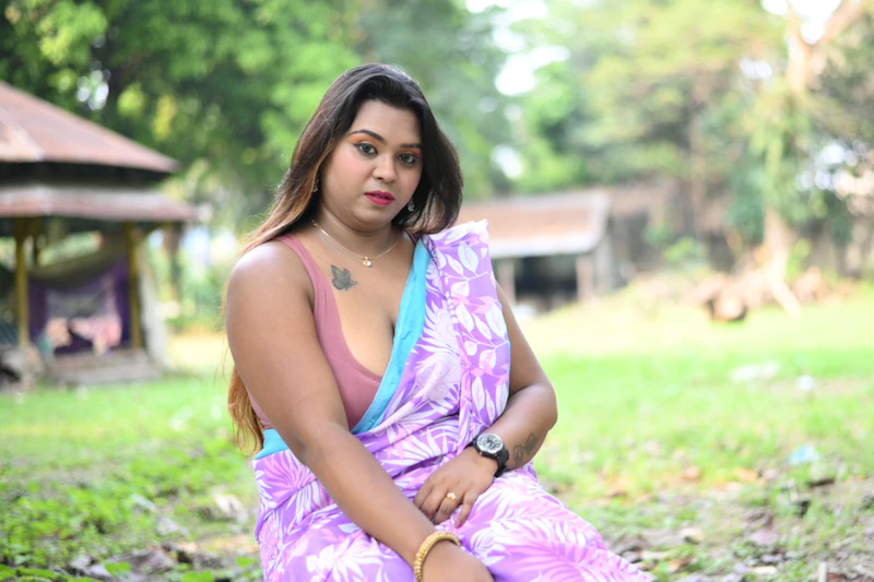 Graceful Indian woman, potential sugar momma, in a purple dress