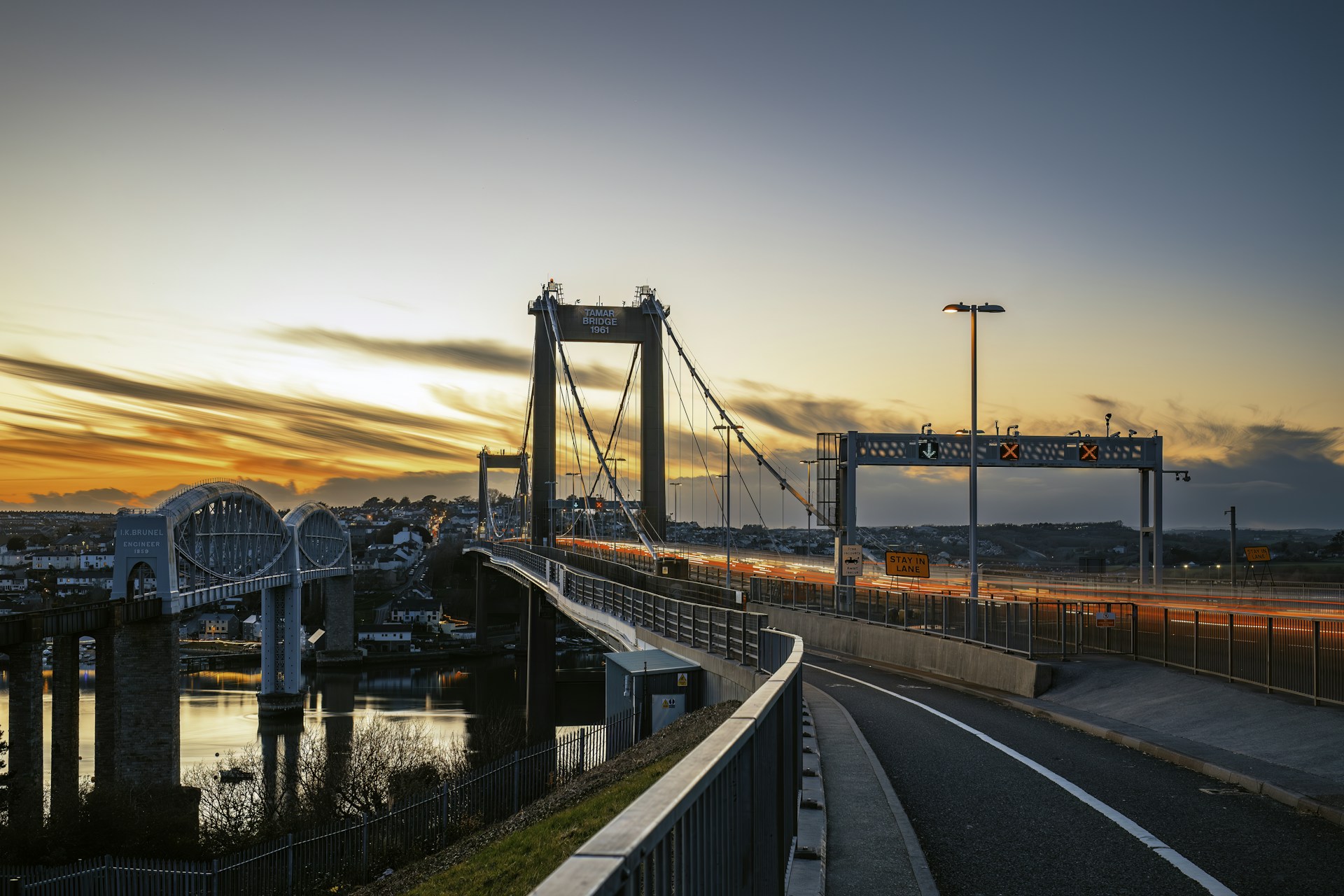 a bridge that has a train going over it