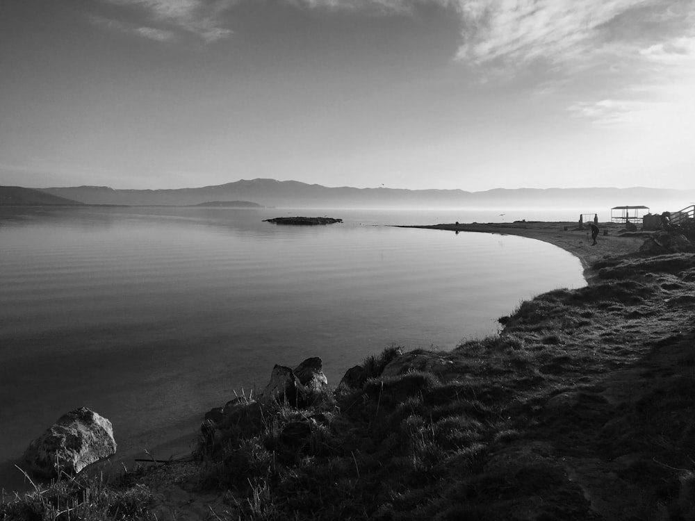 a black and white photo of a body of water