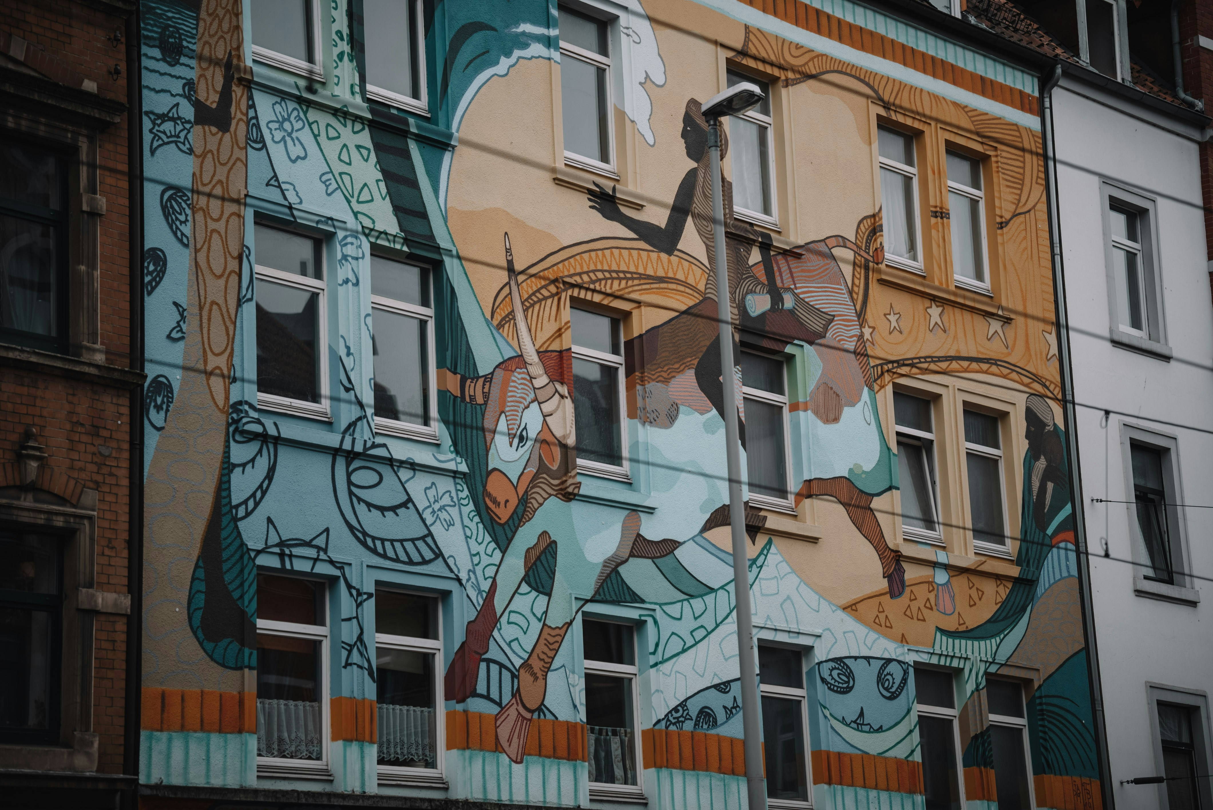 a building with a mural on the side of it