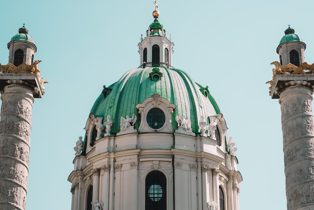 a green and white dome on top of a building